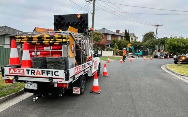 A2Z Traffic vehicle deployed on a residential street with cones and signage in place, actively managing a safe work zone during local infrastructure or utility works in suburban Melbourne.
