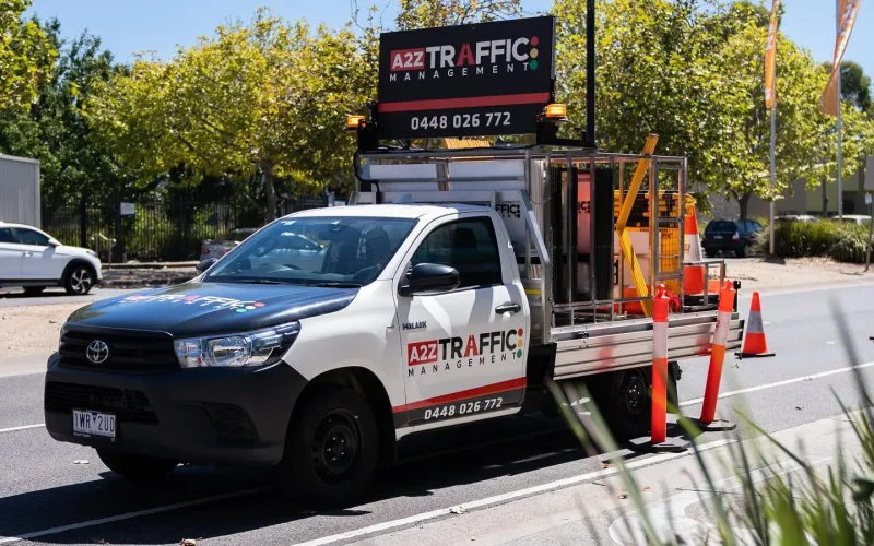 A2Z Traffic management vehicle with cones set up for road safety in Victoria.