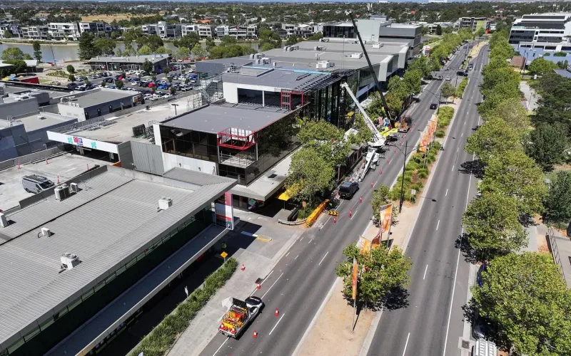 Aerial view of A2Z Traffic management vehicles and cones controlling traffic near a construction site in Victoria.