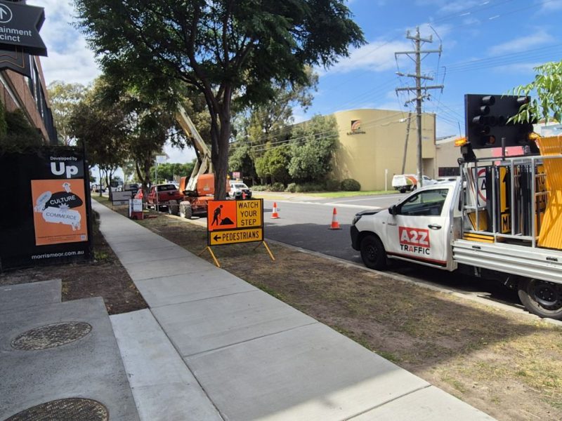 A2Z Traffic vehicle set up at a Melbourne footpath work zone, with safety signage and equipment in place to guide pedestrians and manage roadside construction safely.